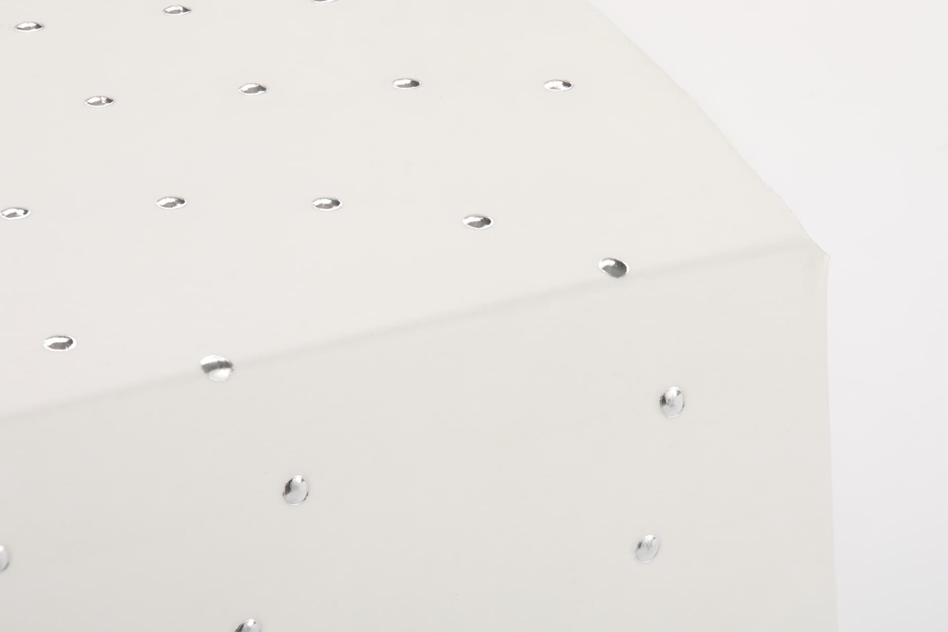 Close-up of Peel N Tear box showing silver metallic polka dot embellishments