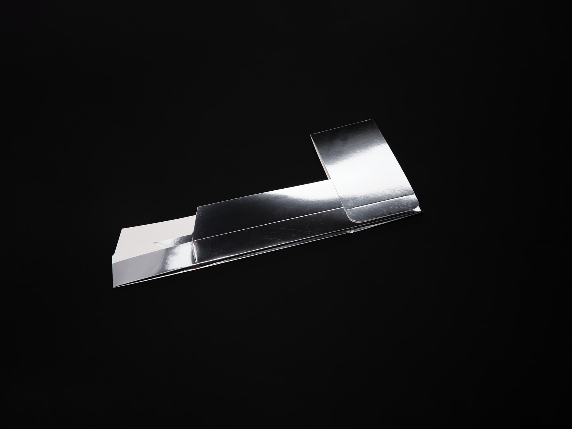 Silver metallic parent carton unfolded flat