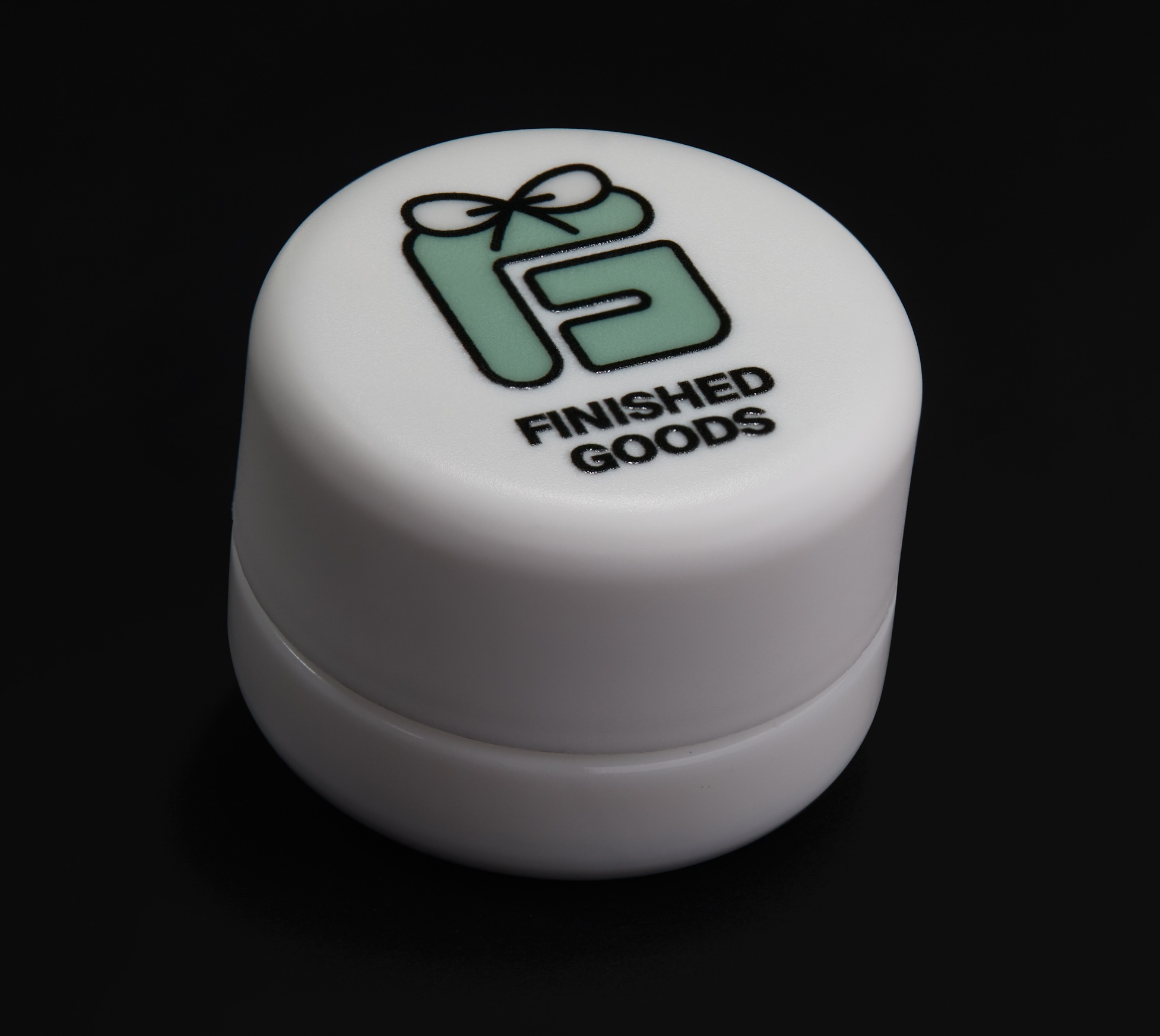 Custom branded concentrate jar lid with Finished Goods logo UV printed