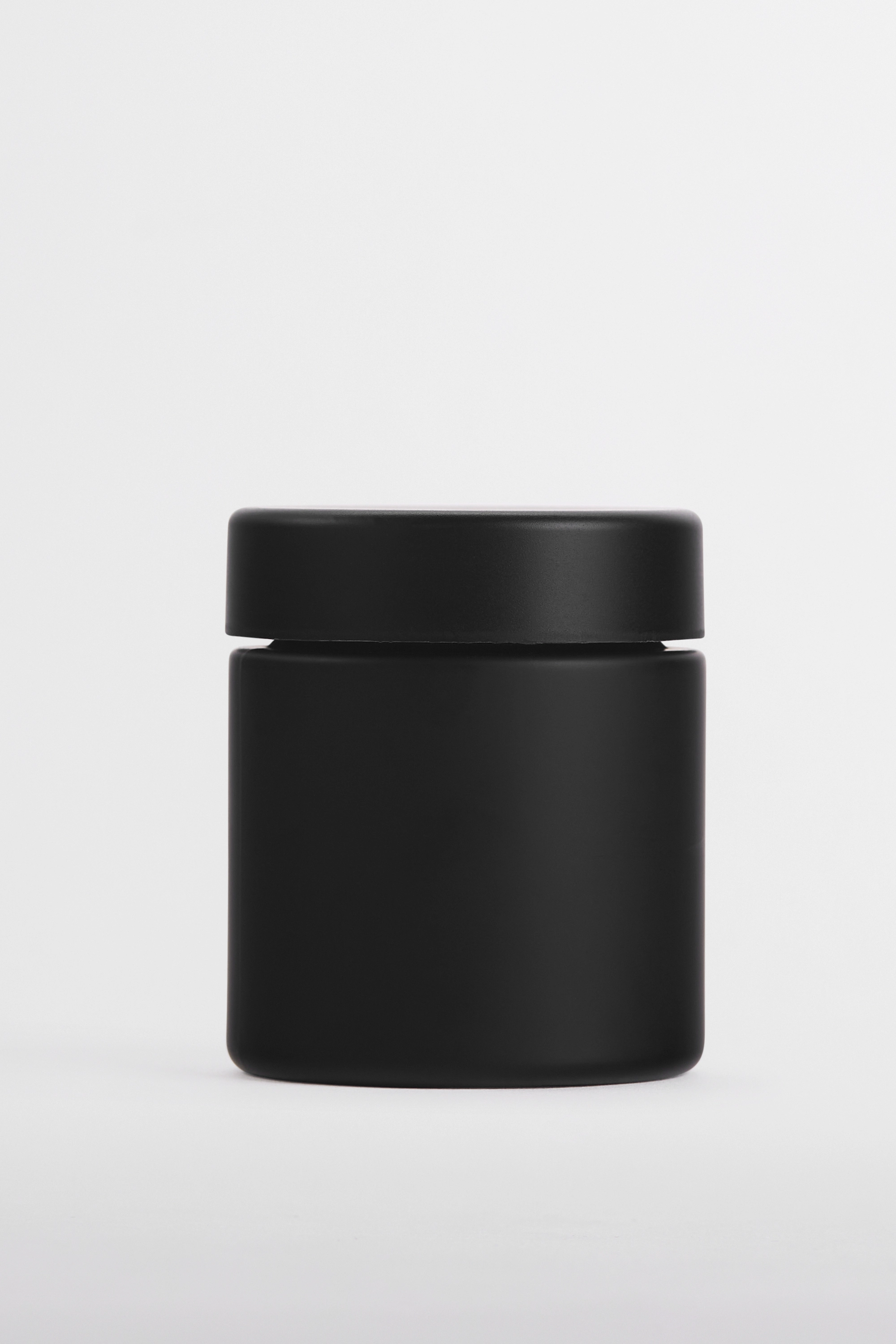 Black pigment child-resistant glass jar