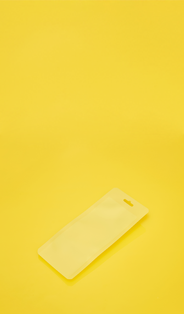 Child resistant mylar bag on yellow background