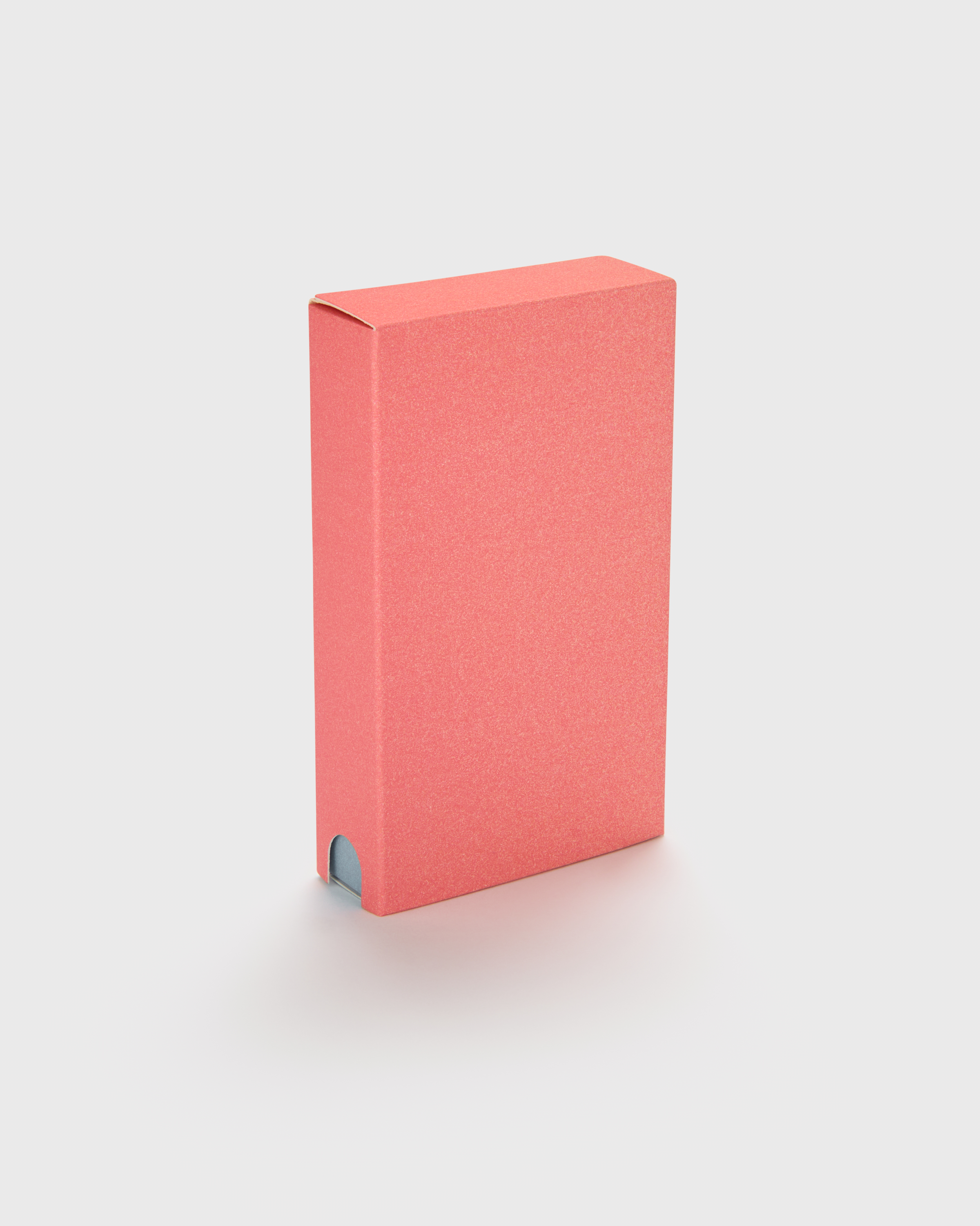Open paper slide box revealing the device inside